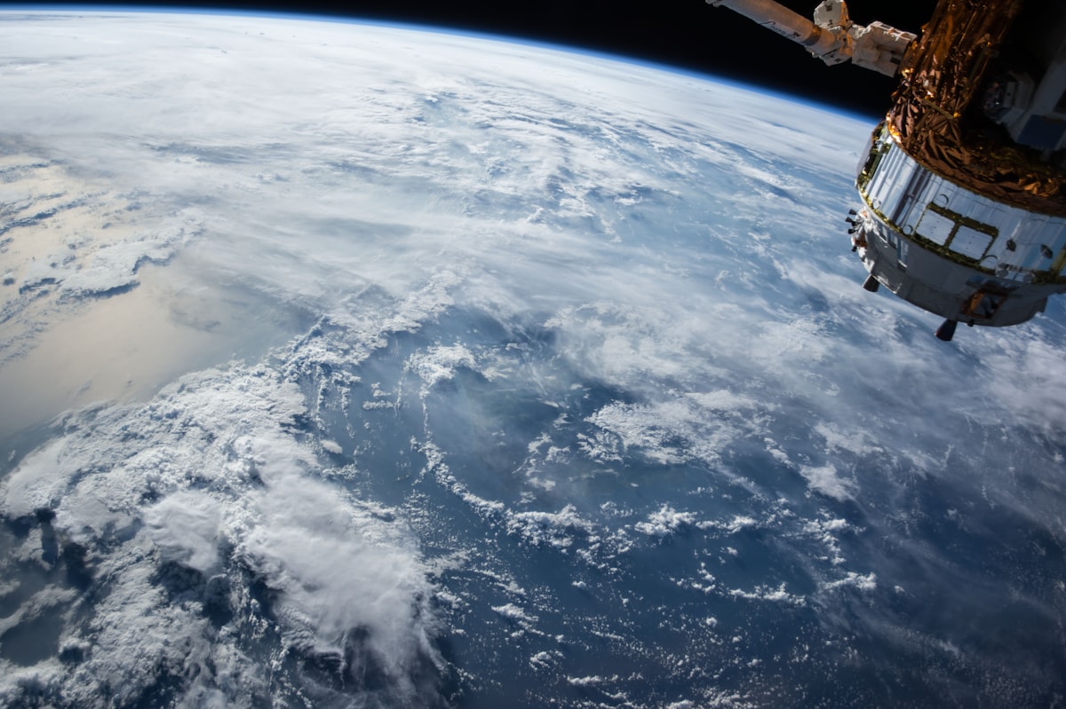 Satellite capturing imagery of Earth from orbit